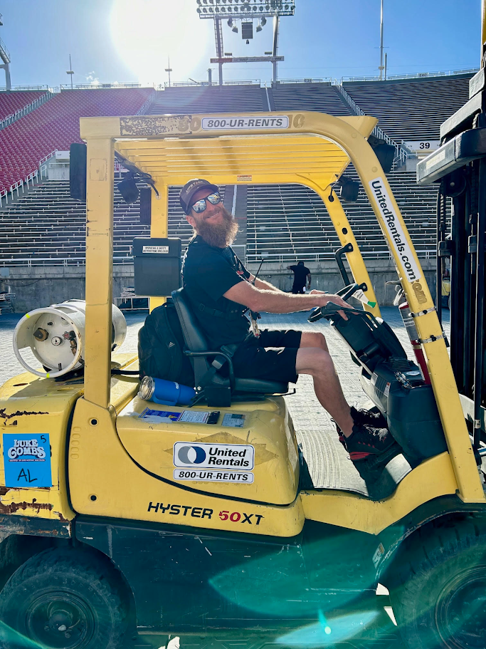 employee driving a forklift